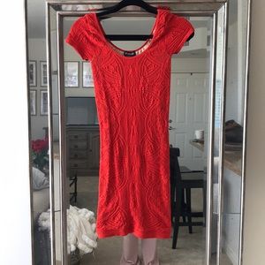 Hot orange bodycon dress from Bebe